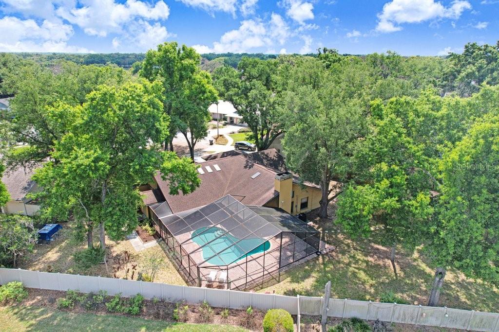 504 Triple Crown Court Seffner, FL 33584 - Photo 8 of 63 an aerial view of a house with a yard