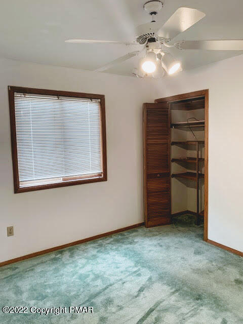 139 Dunchurch Drive Bushkill, PA 18324 - Photo 9 of 12 a view of an empty room with a cabinet and a window