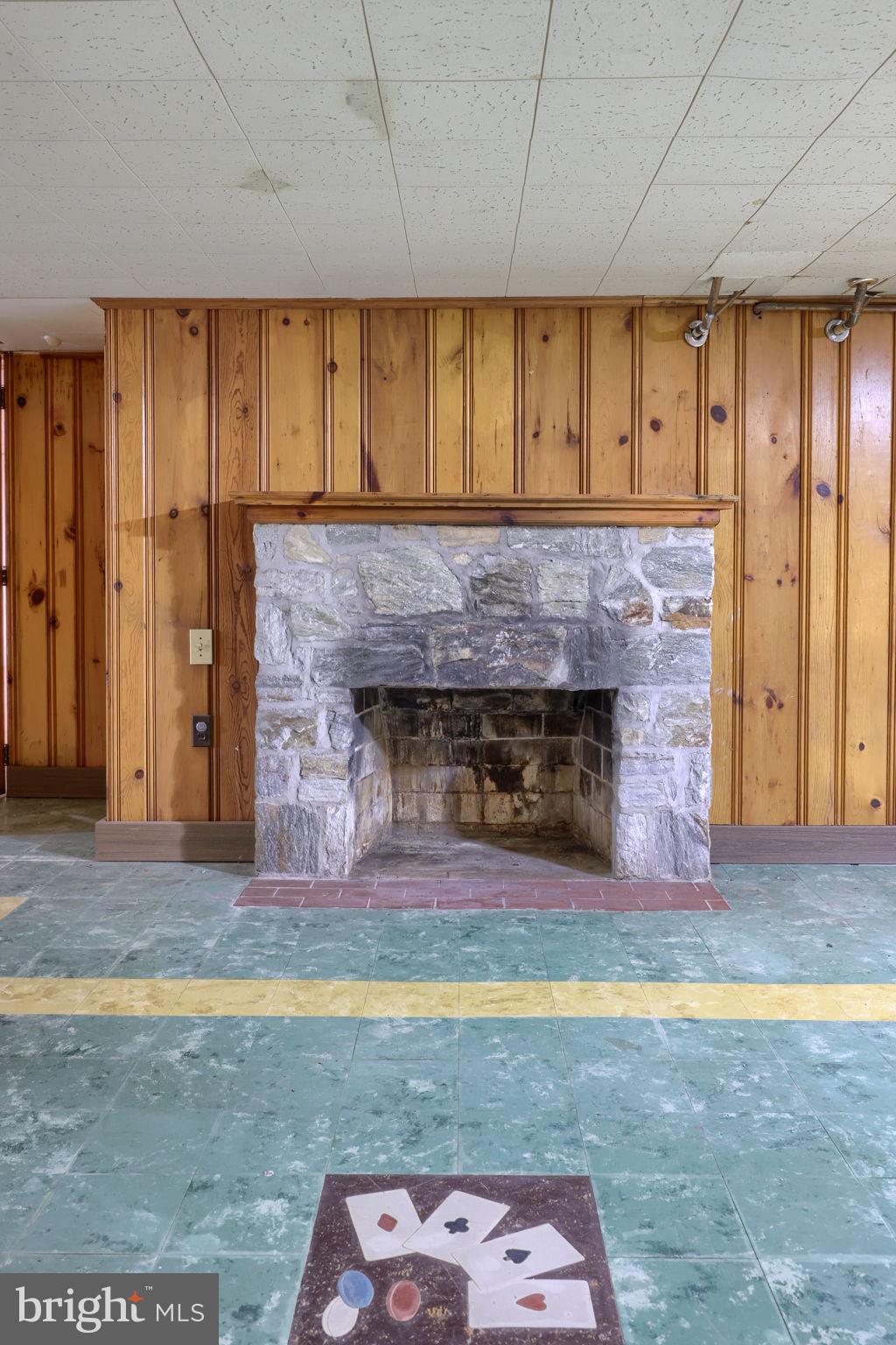 145 Weaver Road Lancaster, PA 17603 - Photo 68 of 87 a view of an empty room with a fireplace and a window