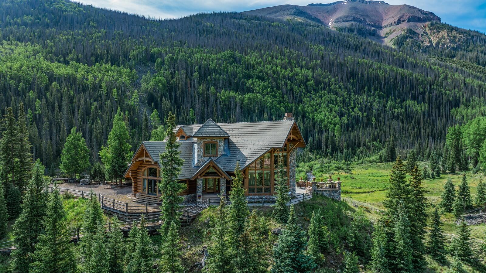 2418 Usfs Road Creede, CO 81130 - Photo 18 of 50 a view of a house with a yard and sitting area