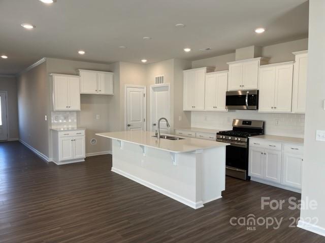 6525 Gopher Road, Unit 361 Lancaster, SC 29720 - Photo 3 of 26 a kitchen with a sink and a stove top oven