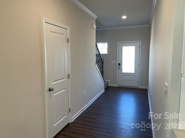 6525 Gopher Road, Unit 361 Lancaster, SC 29720 - Photo 7 of 26 a view of a hallway with wooden floor and staircase