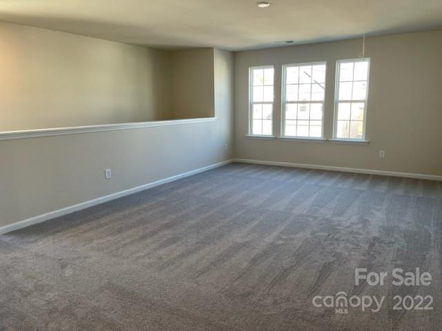 6525 Gopher Road, Unit 361 Lancaster, SC 29720 - Photo 8 of 26 an empty room with windows