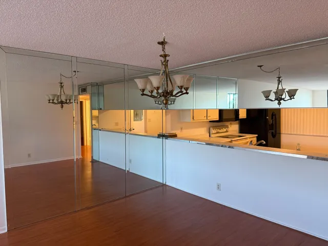 a view of a kitchen with a sink and dishwasher a kitchen view