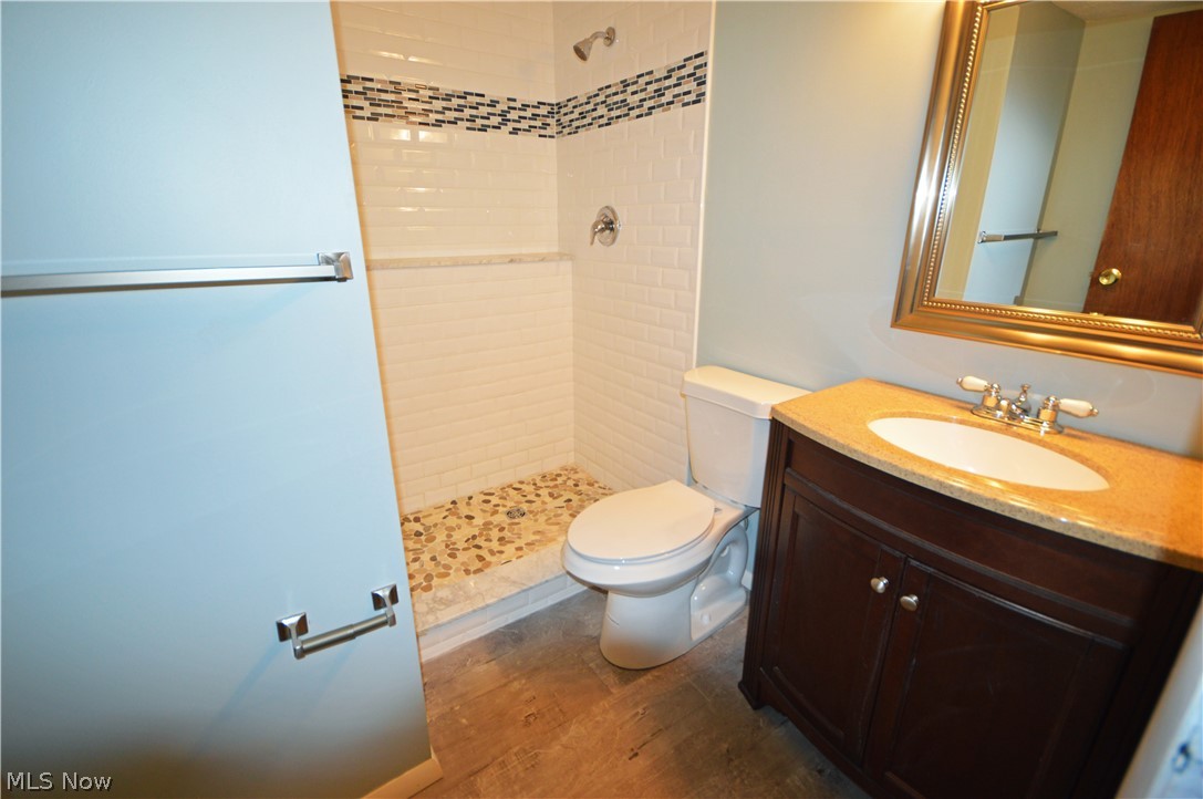 1657 Travers Road Madison, OH 44057 - Photo 12 of 18 Lower Level Bath has Walk-in Shower.