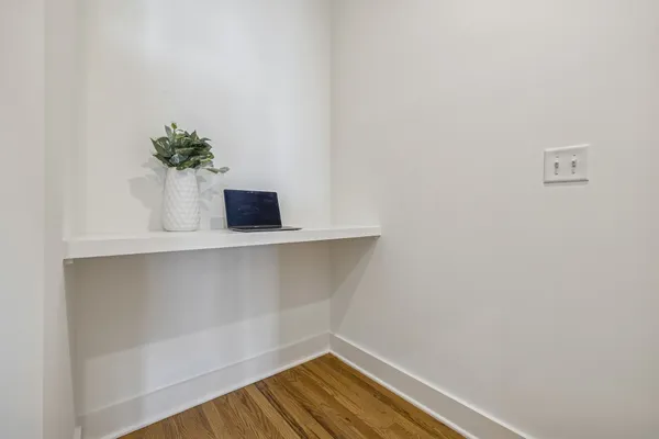 a bedroom with a bed and a cabinets