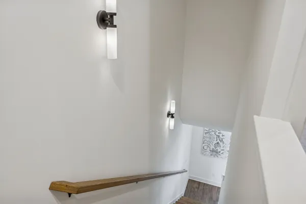 a view of bathroom with wooden floor