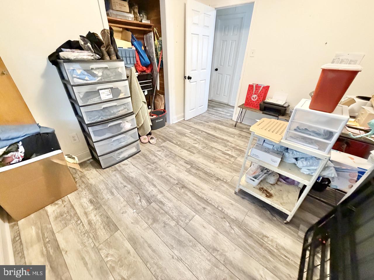 2413 Shelburn Road Millville, NJ 08332 - Photo 29 of 41 a view of walk in closet with clothes and shoes