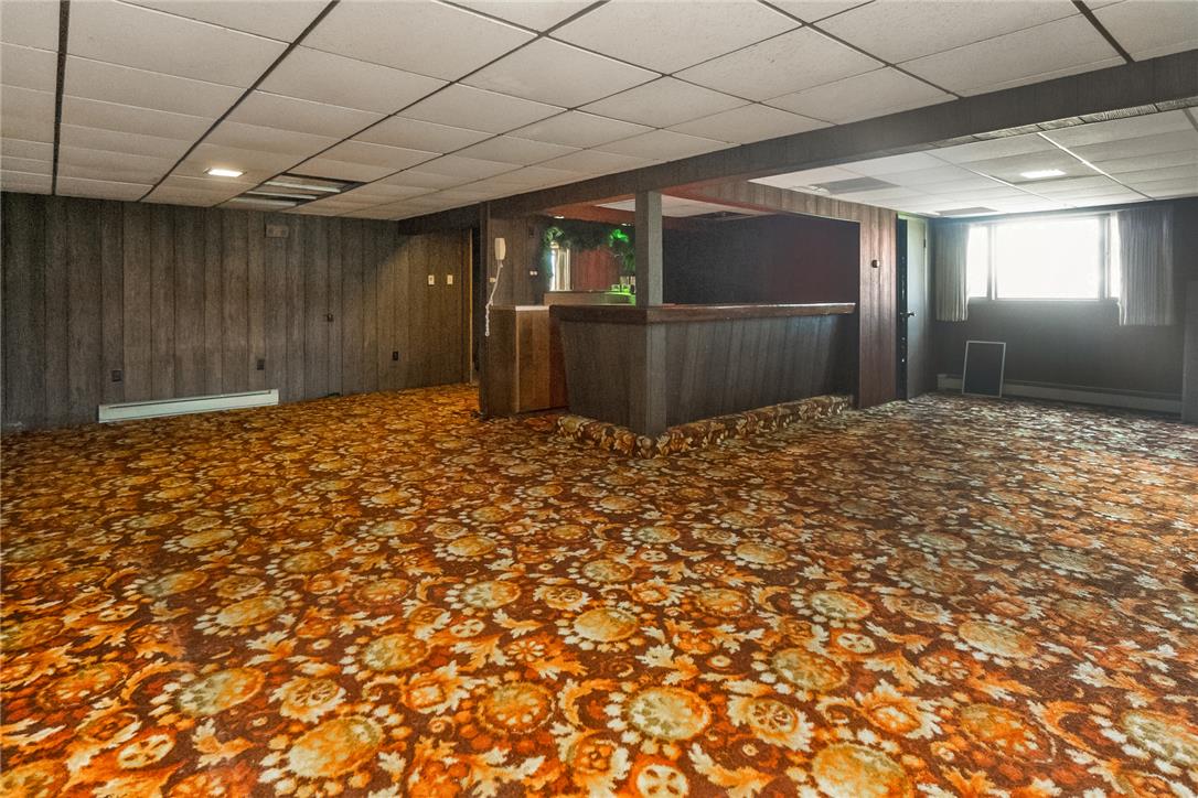 1657 Clearview Road Coplay, PA 18037 - Photo 66 of 77 A retro-themed entertainment area with a built-in bar, perfect for gatherings.