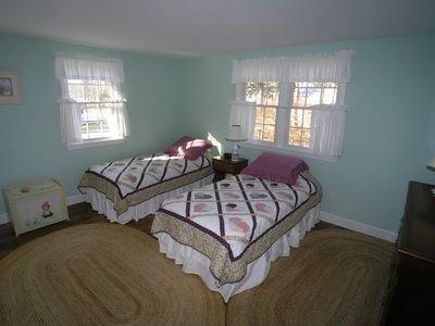 5 Wood Road Dennis Port, MA 02639 - Photo 6 of 7 a bedroom with a bed and window