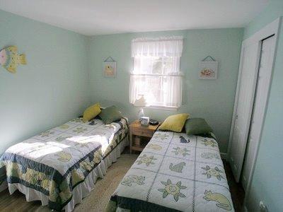 5 Wood Road Dennis Port, MA 02639 - Photo 7 of 7 a bedroom with two beds and a window