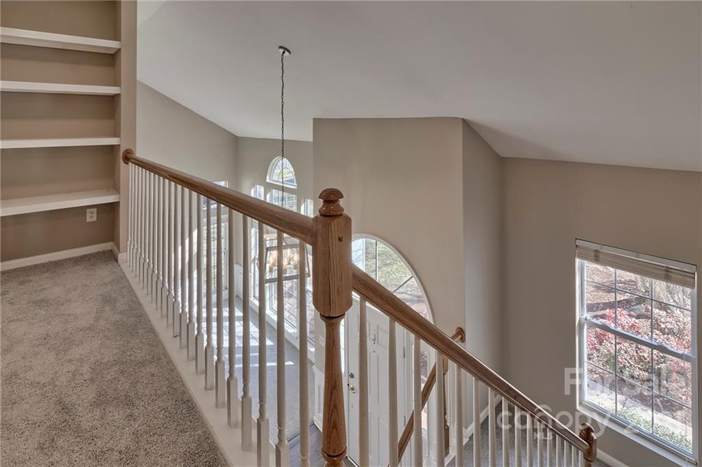 4821 Brownes Ferry Road Charlotte, NC 28269 - Photo 29 of 37 a view of a hallway with window