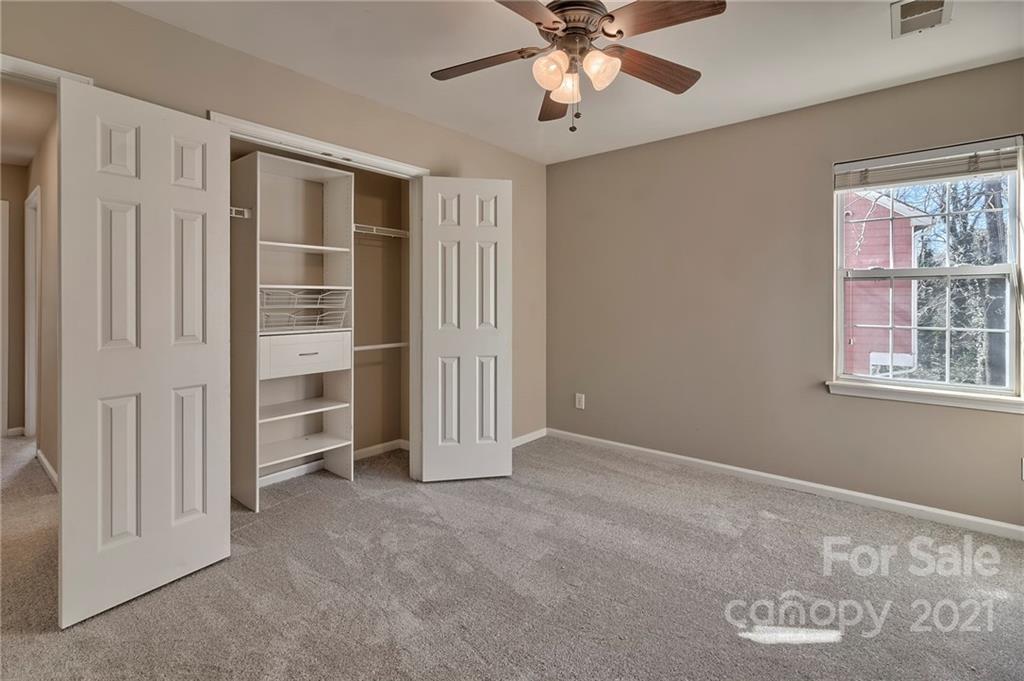 4821 Brownes Ferry Road Charlotte, NC 28269 - Photo 35 of 37 a view of an empty room with a window