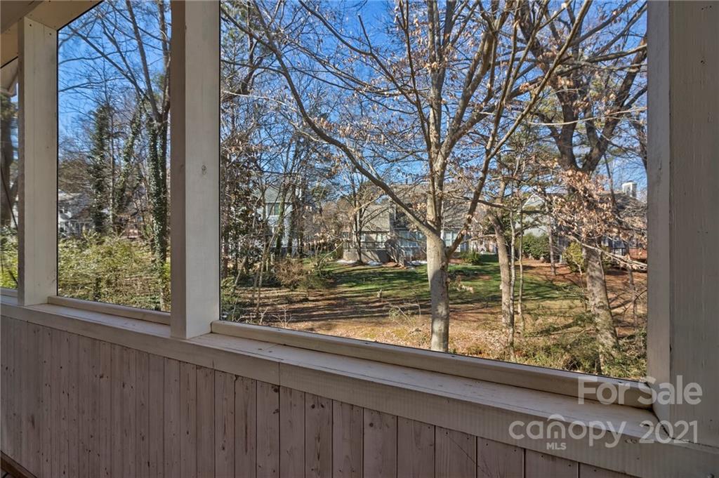 4821 Brownes Ferry Road Charlotte, NC 28269 - Photo 7 of 37 a view of a yard from a window