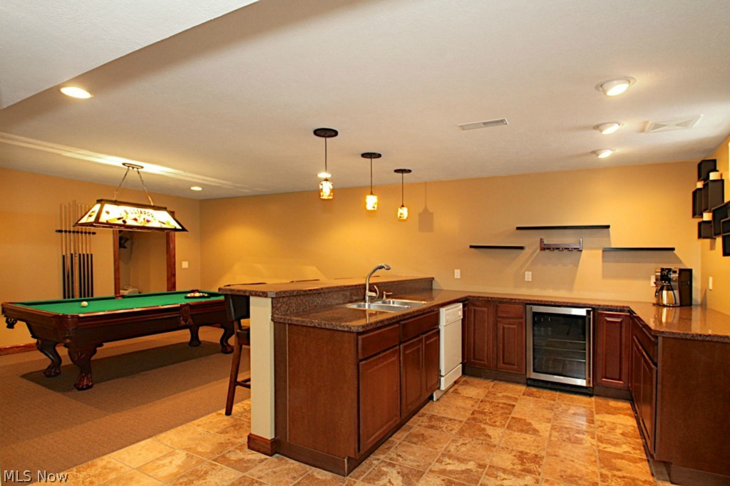 38557 Otten Road North Ridgeville, OH 44039 - Photo 17 of 25 Lower-level kitchen: No stove currently but gas line is installed.