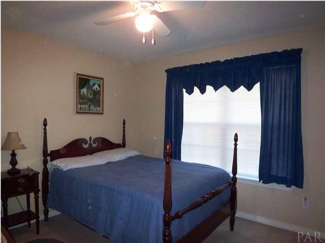 5730 Frank Reeder Road Pensacola, FL 32526 - Photo 15 of 24 Bedroom #2 with large window and double closet. Absolutely ready for you.