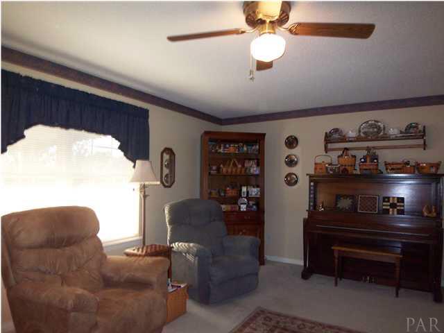 5730 Frank Reeder Road Pensacola, FL 32526 - Photo 6 of 24 Large window in spacious family room with extra cable connection
