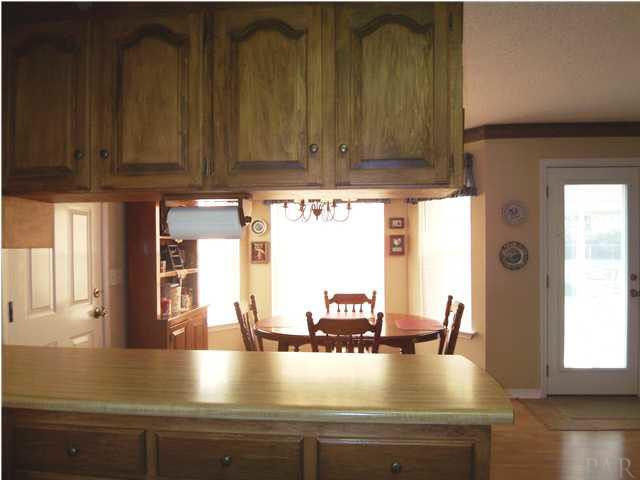 5730 Frank Reeder Road Pensacola, FL 32526 - Photo 10 of 24 View of breakfast nook and breakfast area. Plenty of natural light and view of backyard