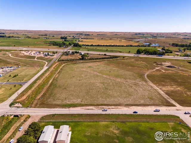 a view of swimming pool with furniture