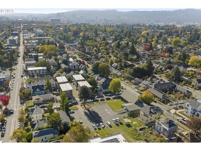 a view of a swimming pool and lounge chairs
