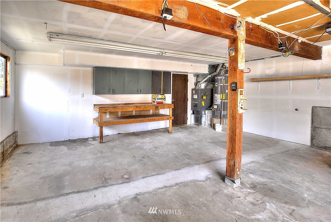 10020 Northeast 204th Street Bothell, WA 98011 - Photo 21 of 30 a view of a room with a wooden roof