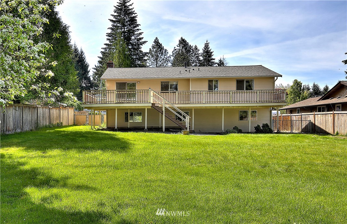 10020 Northeast 204th Street Bothell, WA 98011 - Photo 27 of 30 a view of a house with a backyard