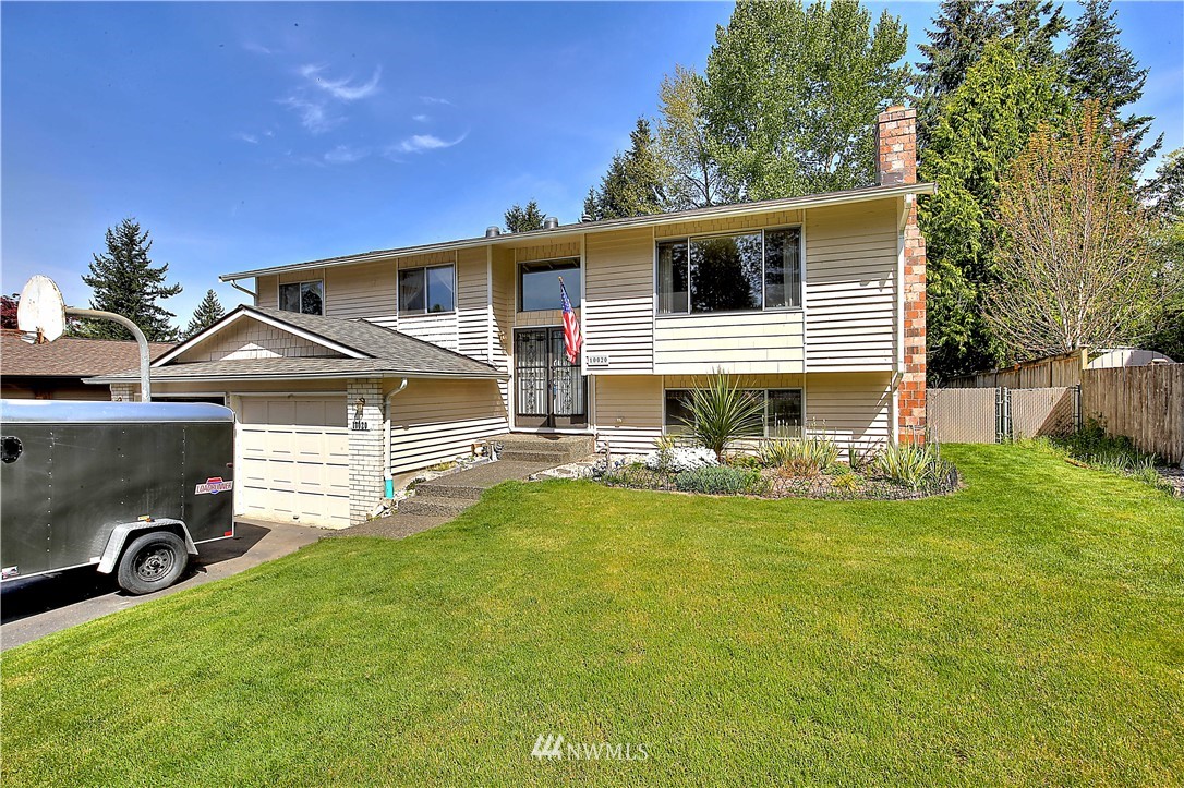 10020 Northeast 204th Street Bothell, WA 98011 - Photo 29 of 30 a view of a house with a backyard