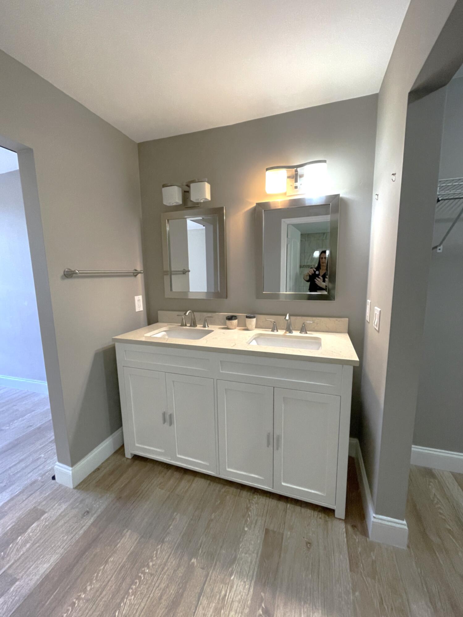 3 Royal Palm Way, Unit 2050 Boca Raton, FL 33432 - Photo 14 of 25 a bathroom with a double vanity sink and mirror