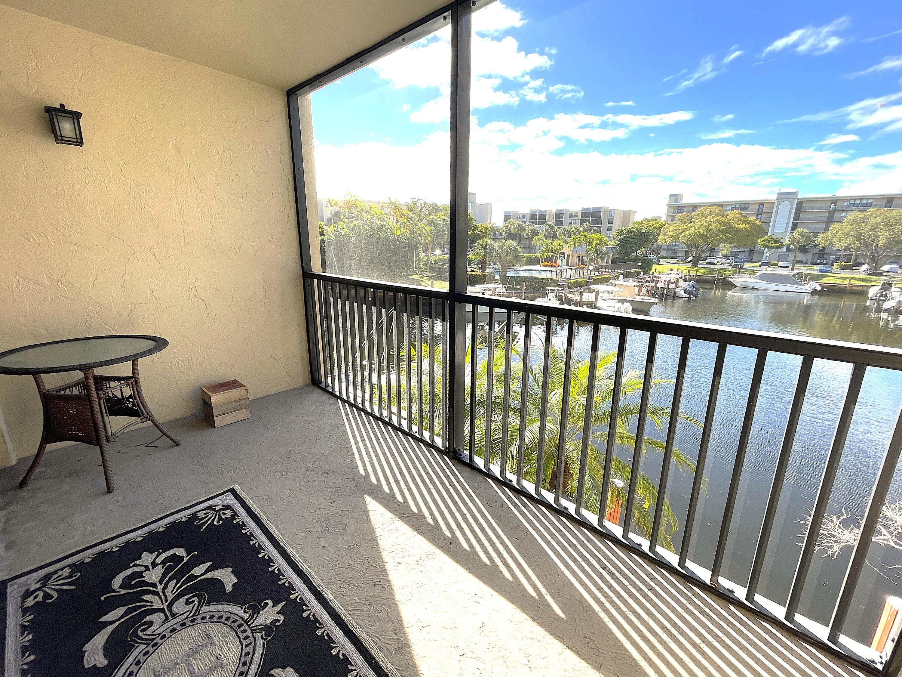 3 Royal Palm Way, Unit 2050 Boca Raton, FL 33432 - Photo 17 of 25 a view of a balcony with furniture