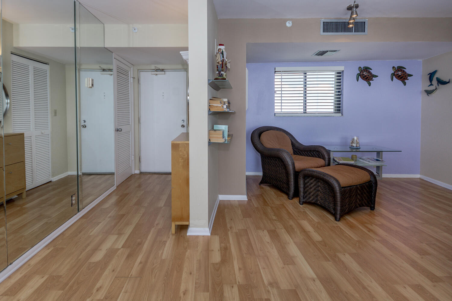 400 Ocean Trail Way, Unit 1405 Jupiter, FL 33477 - Photo 11 of 41 a living room with furniture and a wooden floor