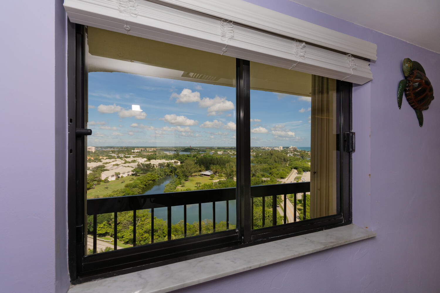 400 Ocean Trail Way, Unit 1405 Jupiter, FL 33477 - Photo 16 of 41 a view of a glass door and a window