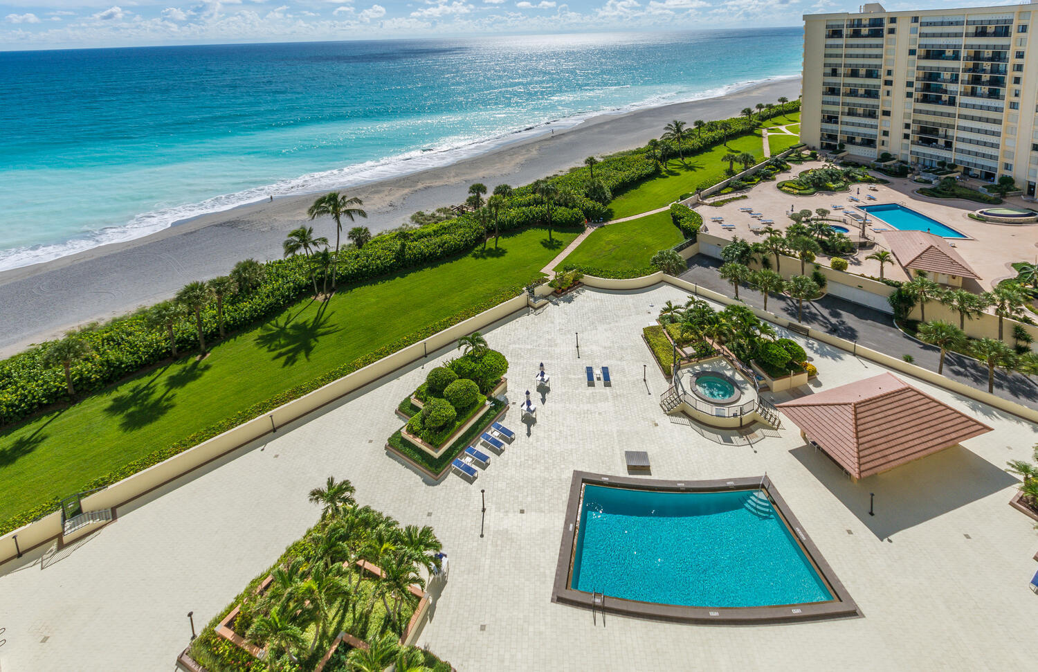 400 Ocean Trail Way, Unit 1405 Jupiter, FL 33477 - Photo 3 of 41 a view of swimming pool with a yard
