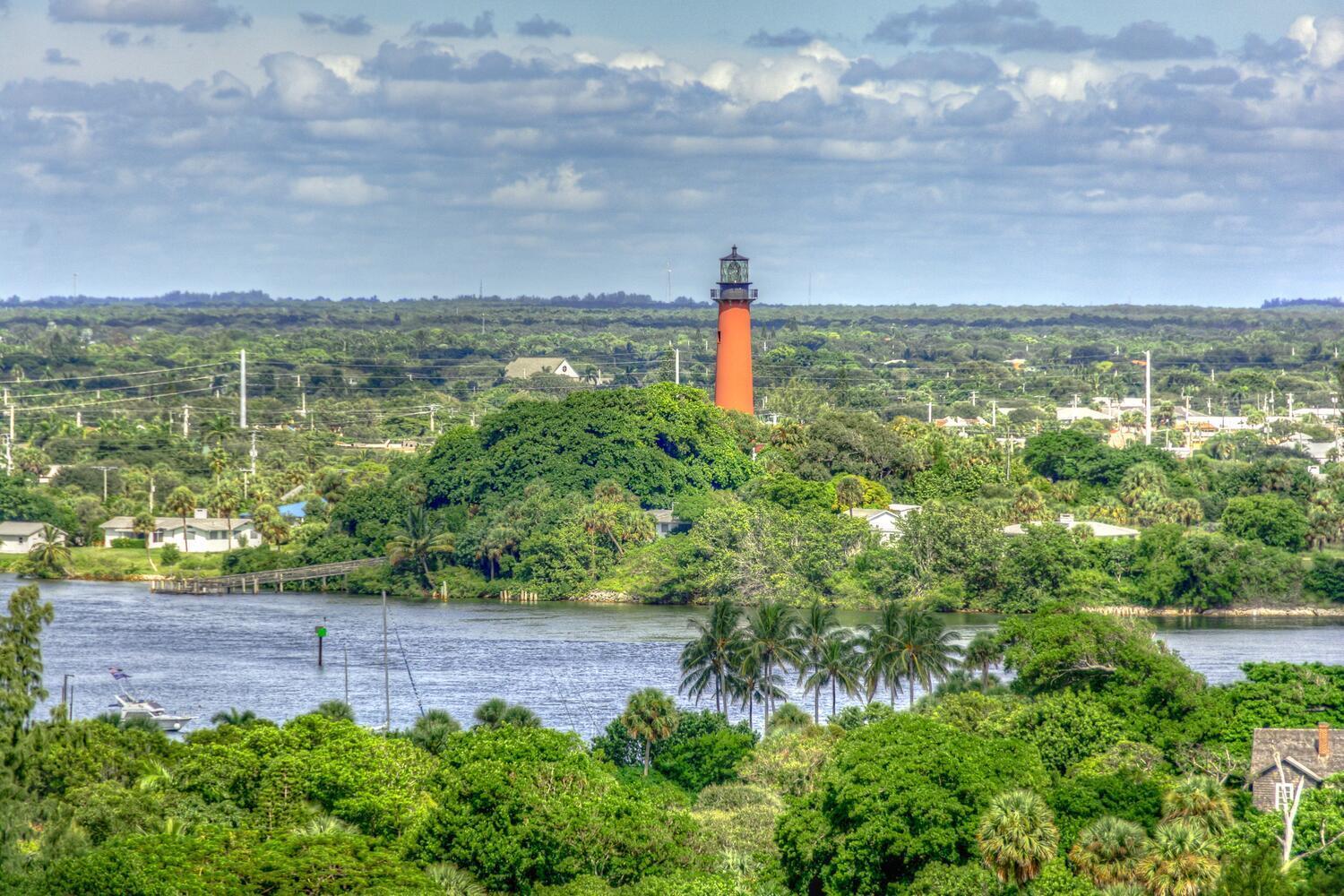 400 Ocean Trail Way, Unit 1405 Jupiter, FL 33477 - Photo 38 of 41 a view of a lake with a yard