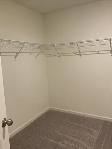 a view of a room with racks on the wall