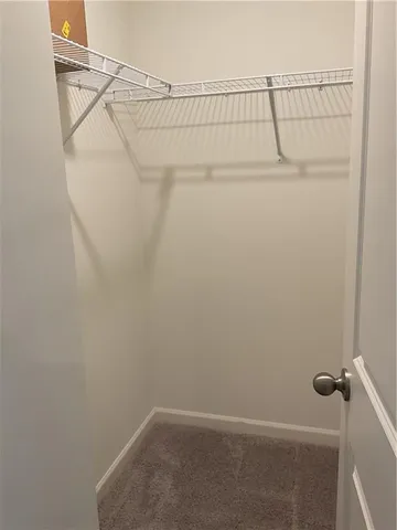 a view of small space with racks on the wall