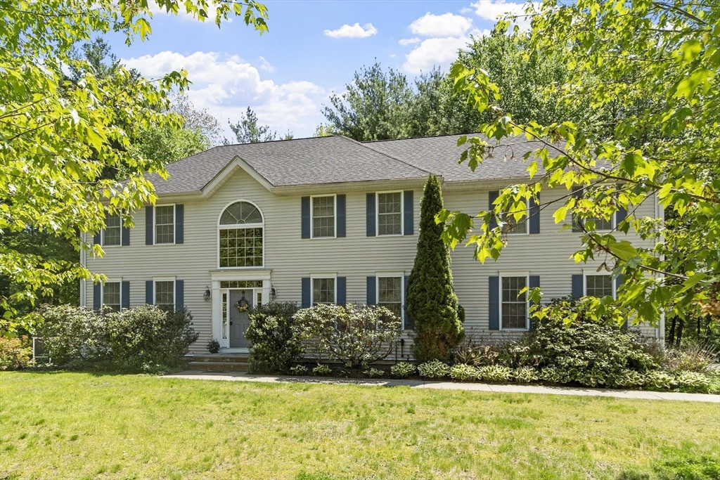 4 Forest Street Georgetown, MA 01833 - Photo 3 of 37 front view of a house with a yard