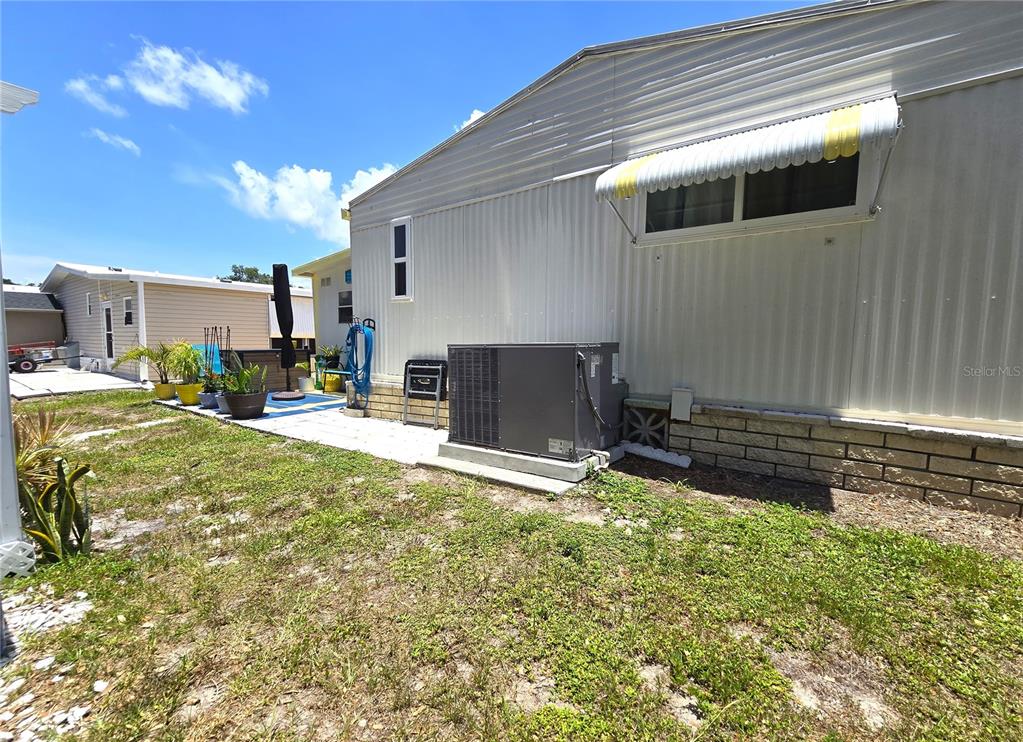 5619 Bayshore Road, Unit 435 Palmetto, FL 34221 - Photo 40 of 56 a view of house with yard