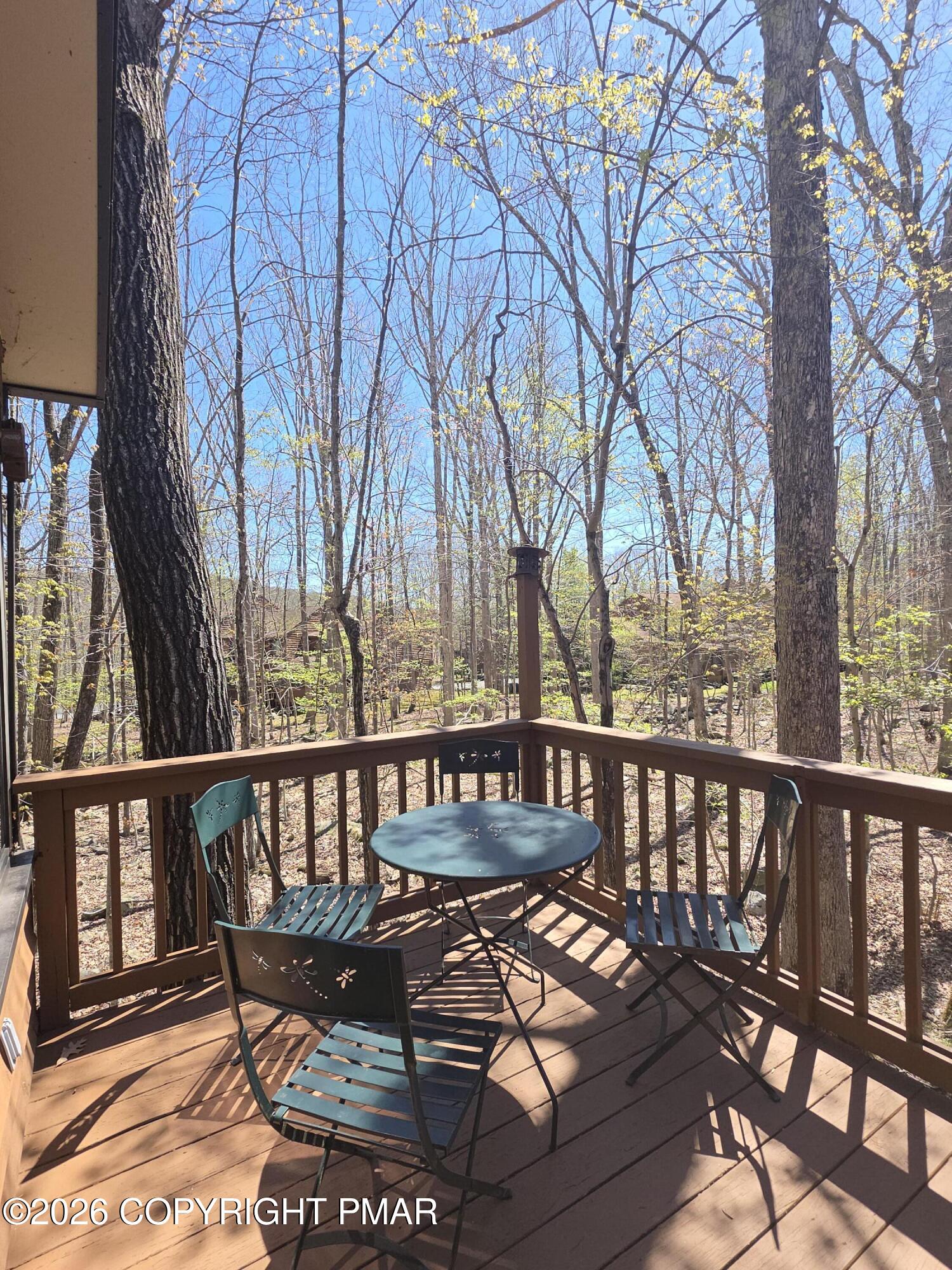 317 Keswick Avenue Bushkill, PA 18324 - Photo 11 of 21 a view of a chairs and table on wooden deck