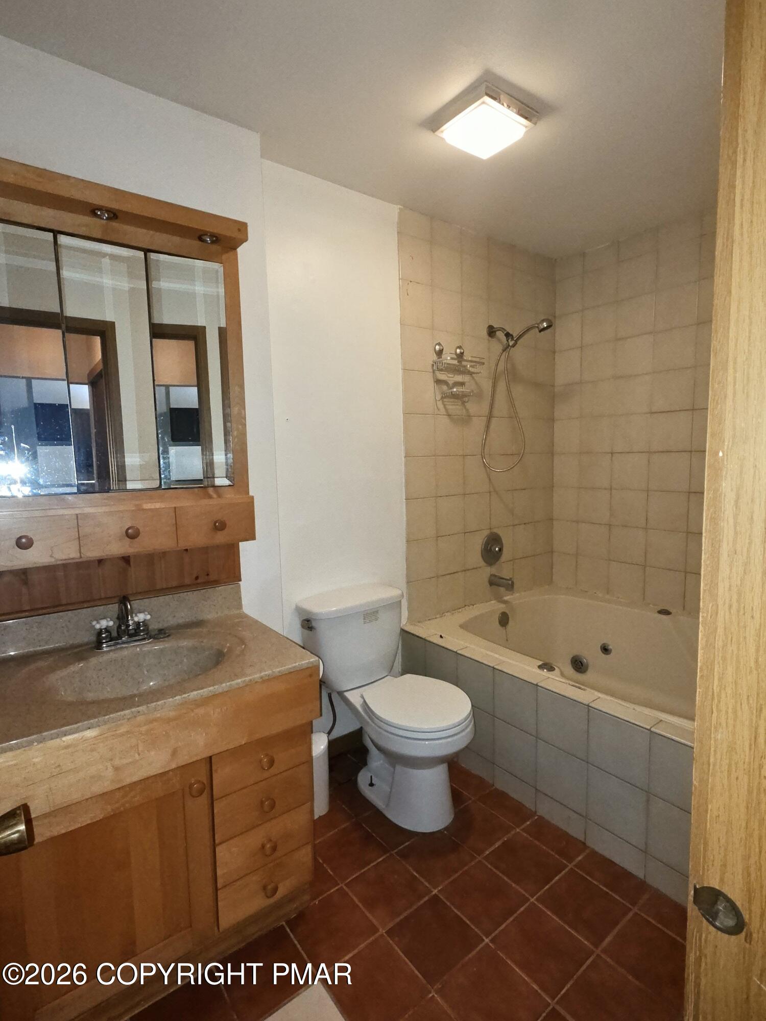 317 Keswick Avenue Bushkill, PA 18324 - Photo 12 of 21 a bathroom with a sink toilet a shower and bathtub