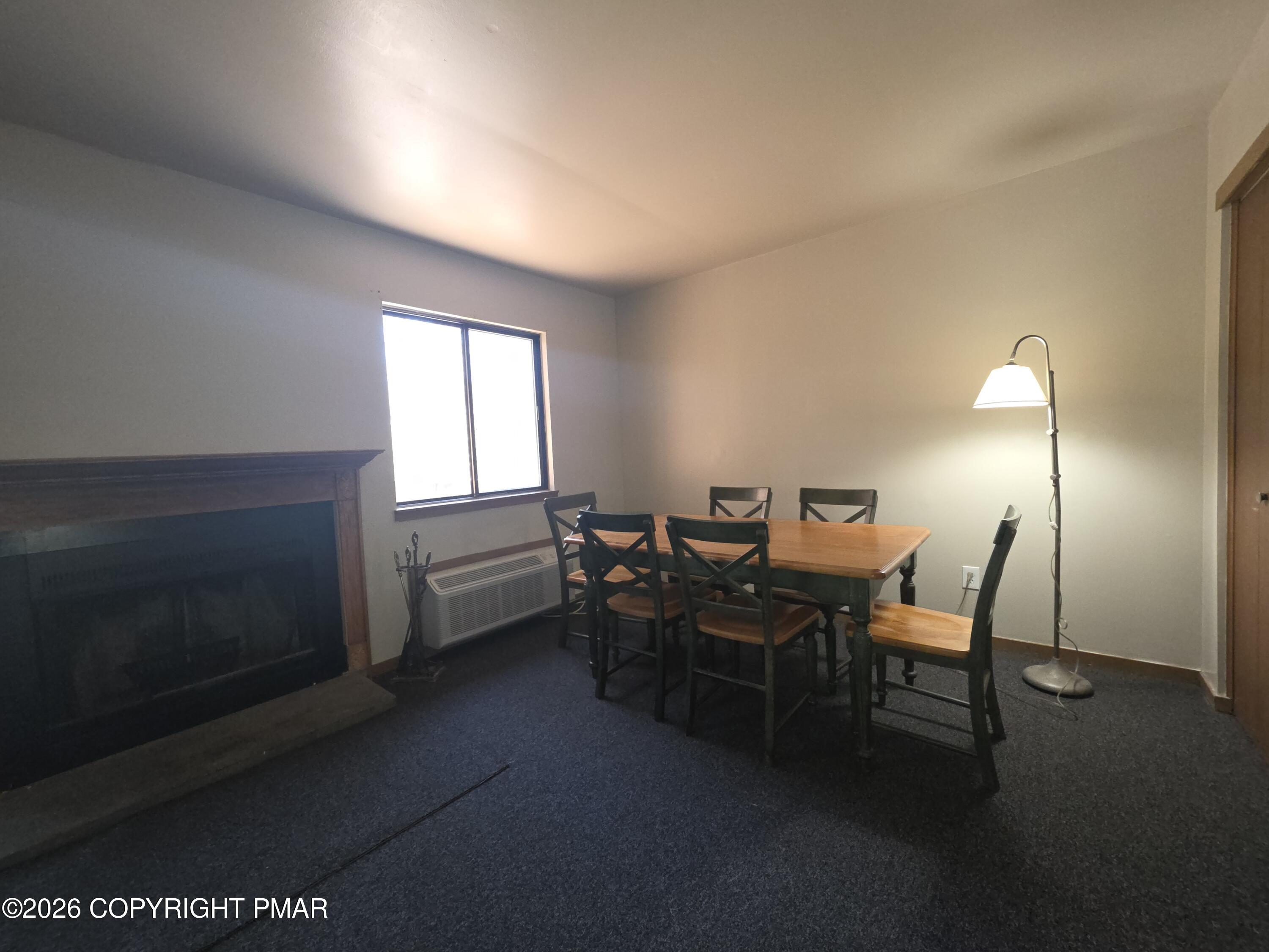317 Keswick Avenue Bushkill, PA 18324 - Photo 16 of 21 a view of a livingroom with furniture and a fireplace