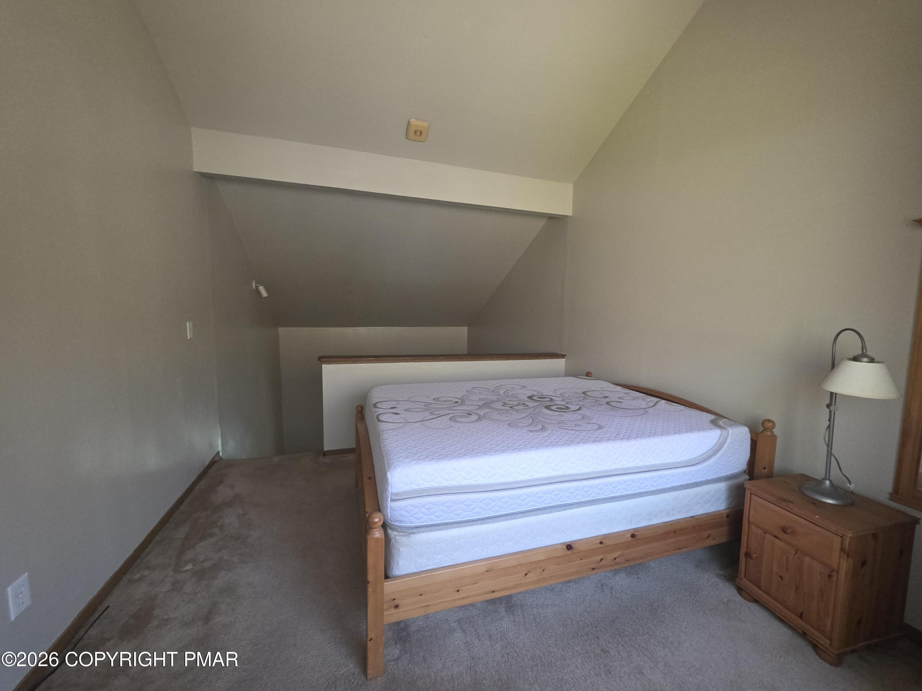 317 Keswick Avenue Bushkill, PA 18324 - Photo 17 of 21 a room with a bed and a table