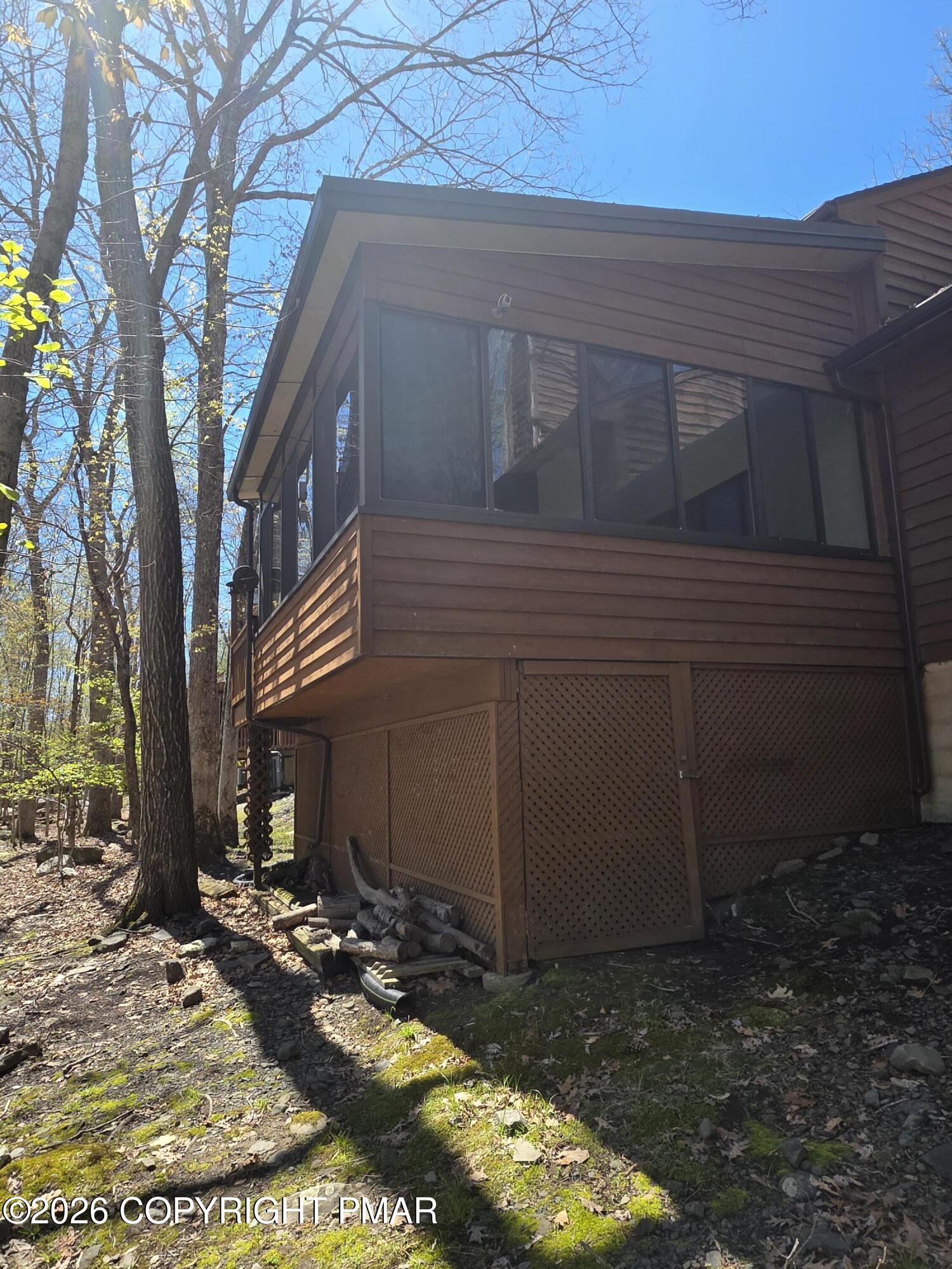 317 Keswick Avenue Bushkill, PA 18324 - Photo 19 of 21 a view of house with backyard space and porch