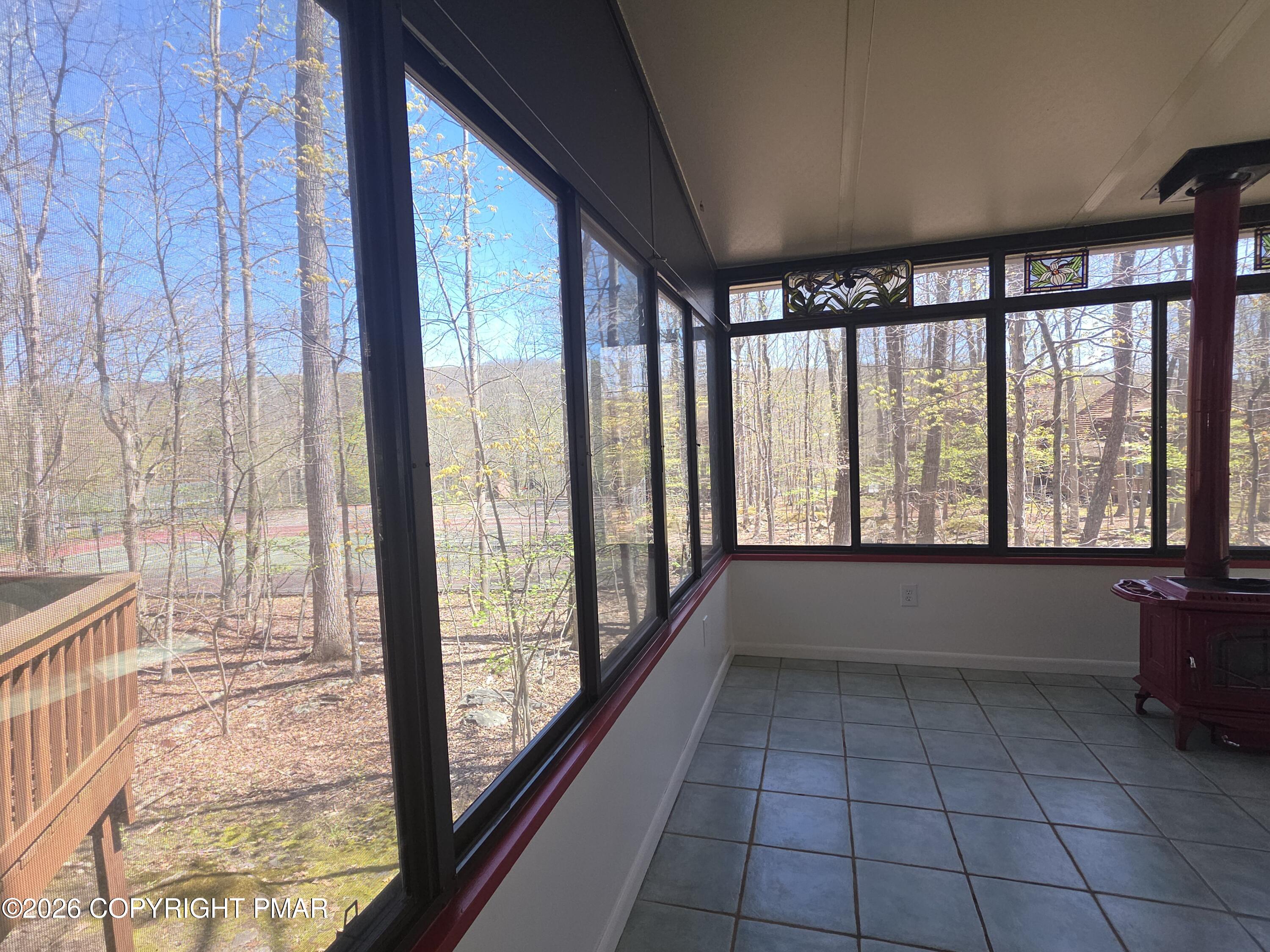 317 Keswick Avenue Bushkill, PA 18324 - Photo 3 of 21 a view of an empty room with a window