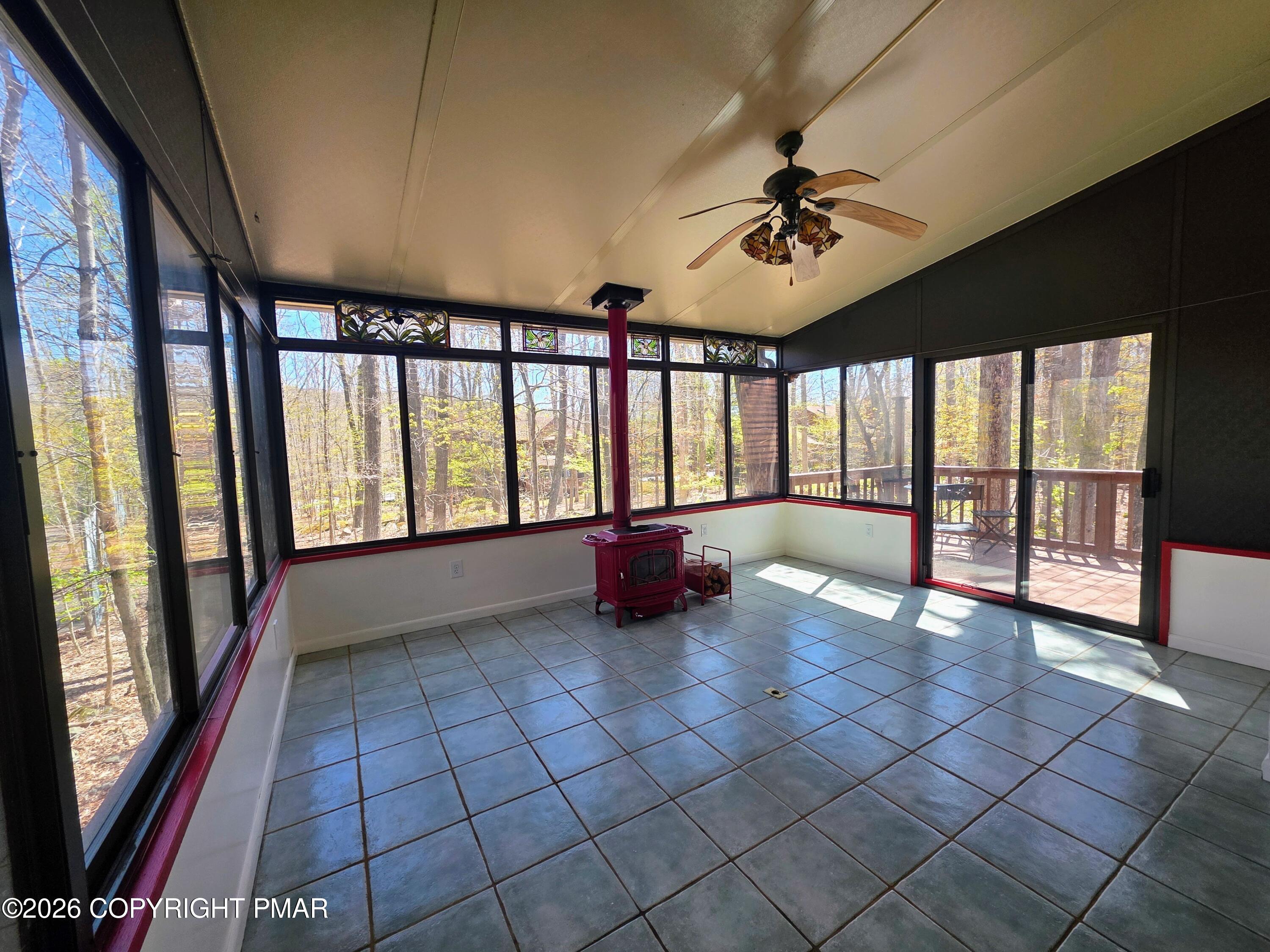 317 Keswick Avenue Bushkill, PA 18324 - Photo 9 of 21 a view of an entryway with a floor to ceiling window