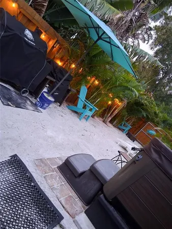 a view of a dry yard with wooden floor