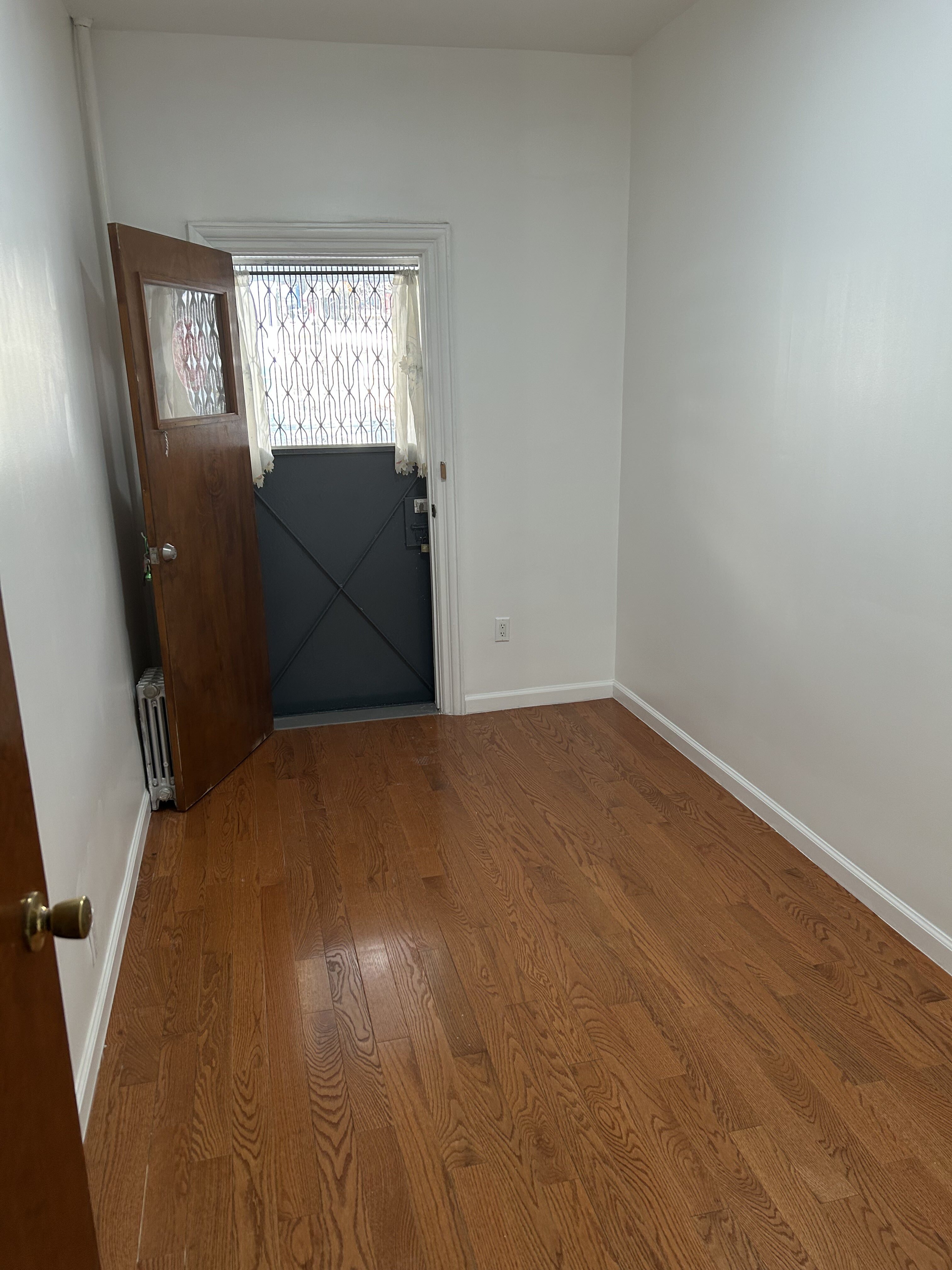 839 53rd Street, Unit 1 Brooklyn, NY 11220 - Photo 7 of 10 an empty room with windows