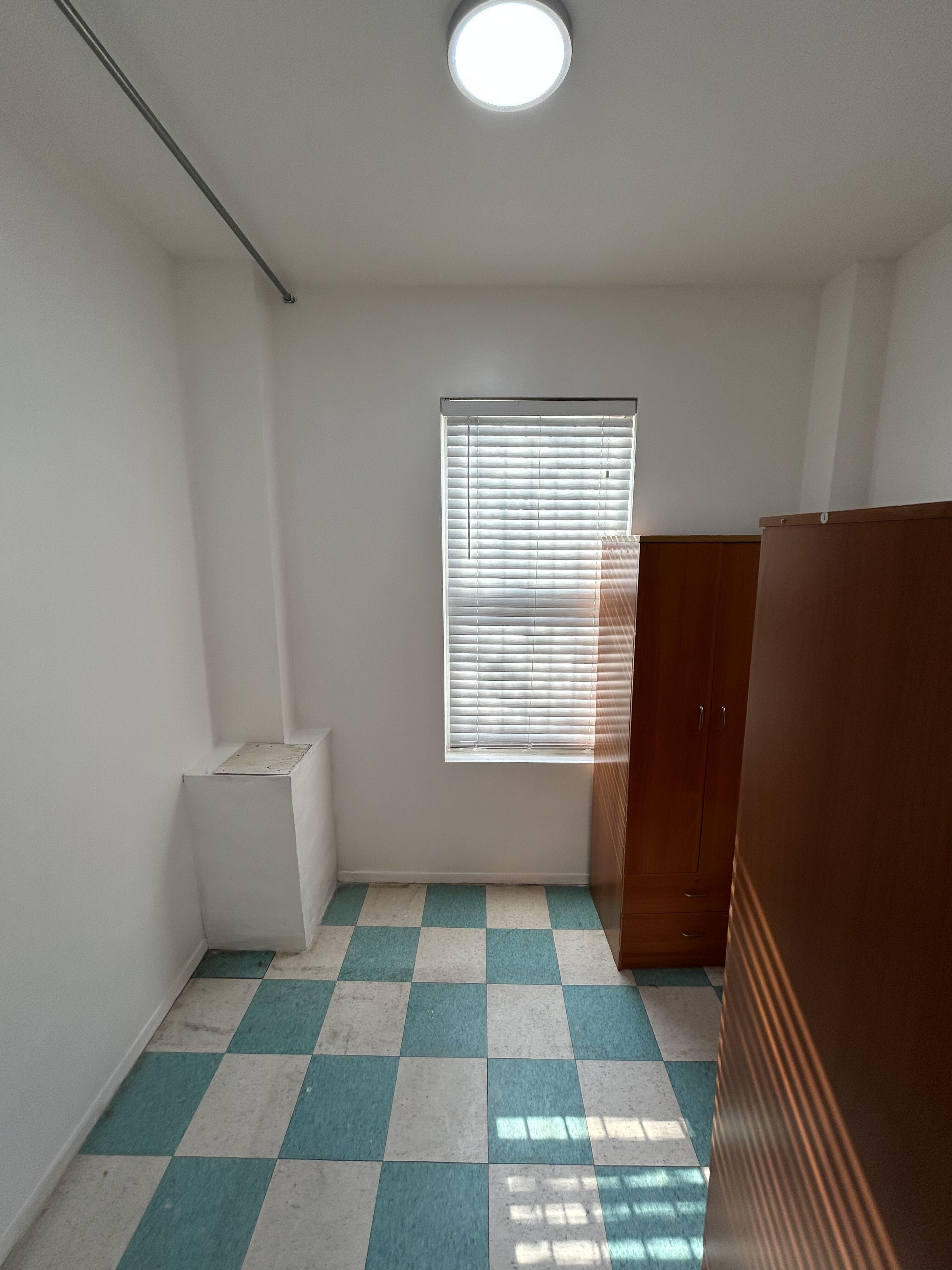 839 53rd Street, Unit 1 Brooklyn, NY 11220 - Photo 10 of 10 a view of an empty room with a window
