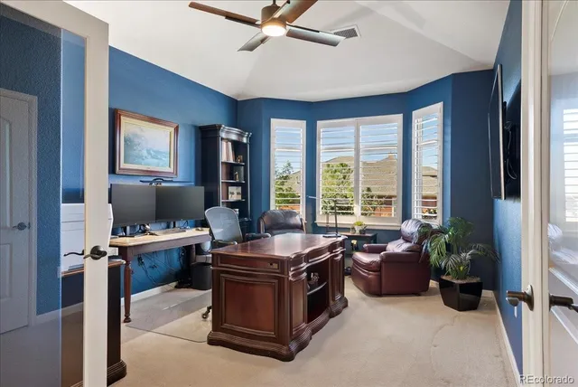 a room with furniture and a window