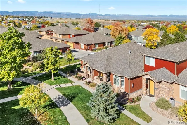 a view of a golf course with an ocean