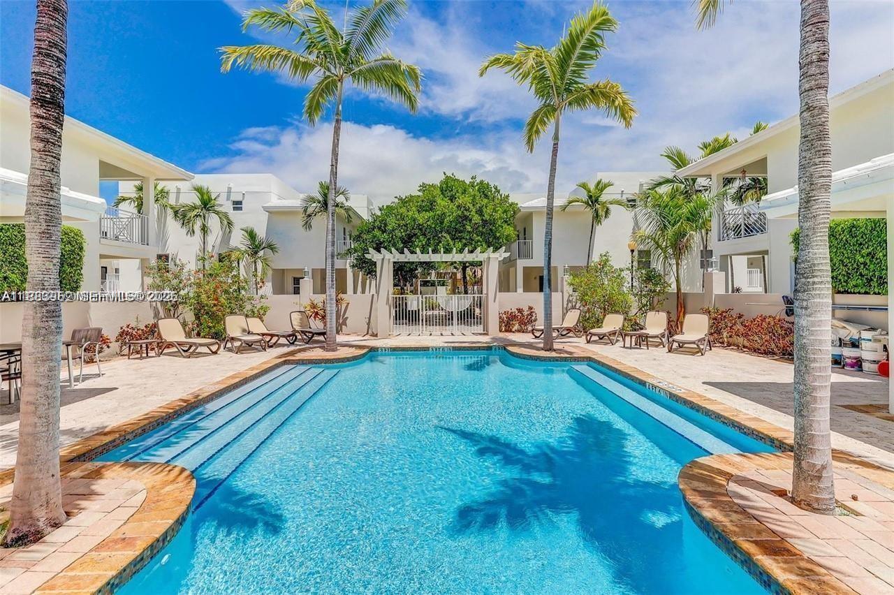 1043 Southwest 9th Court, Unit F1 Miami, FL 33130 - Photo 27 of 27 a view of a swimming pool with a patio